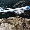 Air Force One flying over Mount Rushmore
